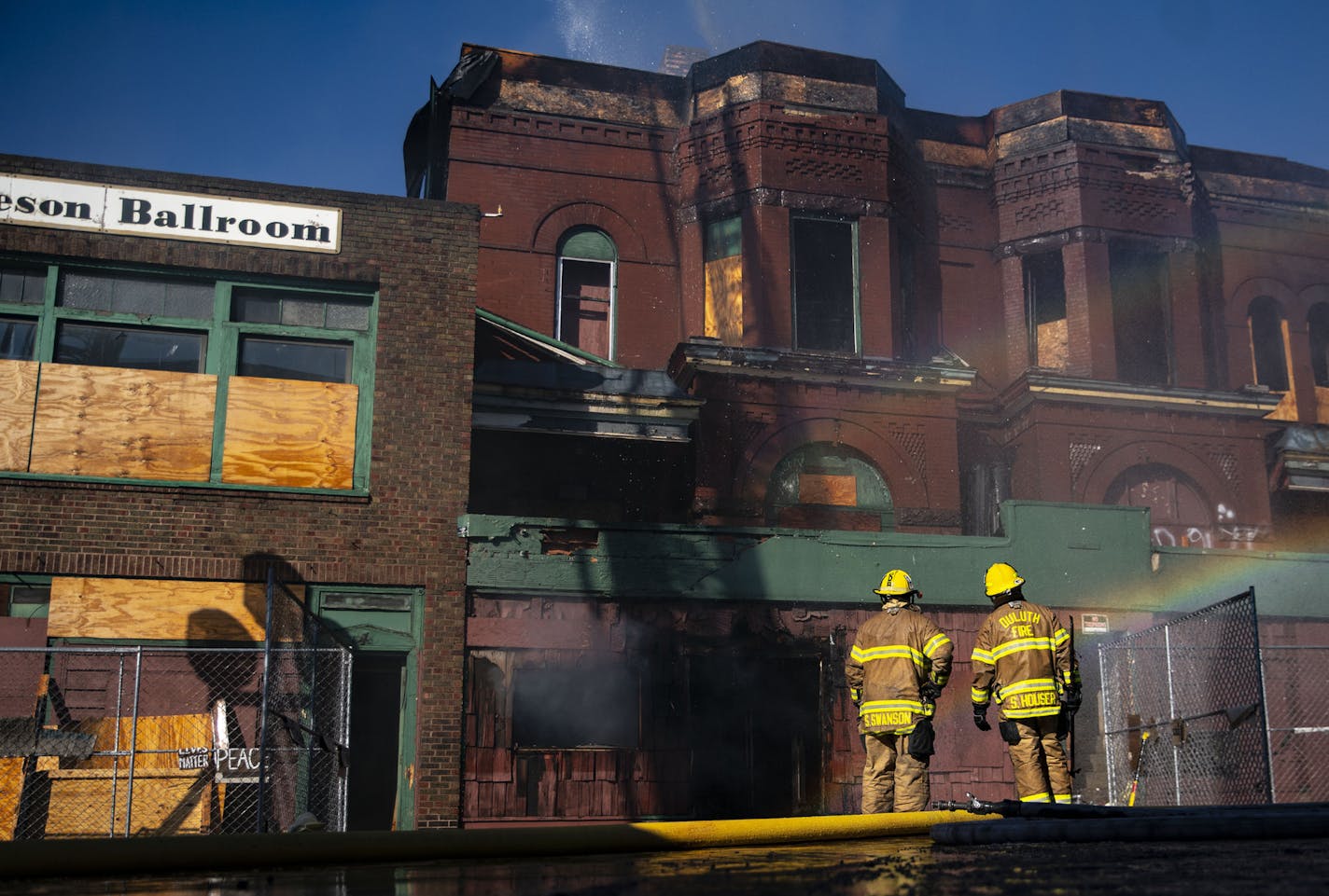 Duluth firefighters worked at putting out a fire at the former Paul Robeson Ballroom and Kozy Bar on Sunday morning. ] ALEX KORMANN • alex.kormann@startribune.com Fire on Sunday has for a second time since May struck the home of the former Paul Robeson Ballroom and Kozy Bar, a downtown Duluth building that is locked in a long-running legal stalemate over its fate.