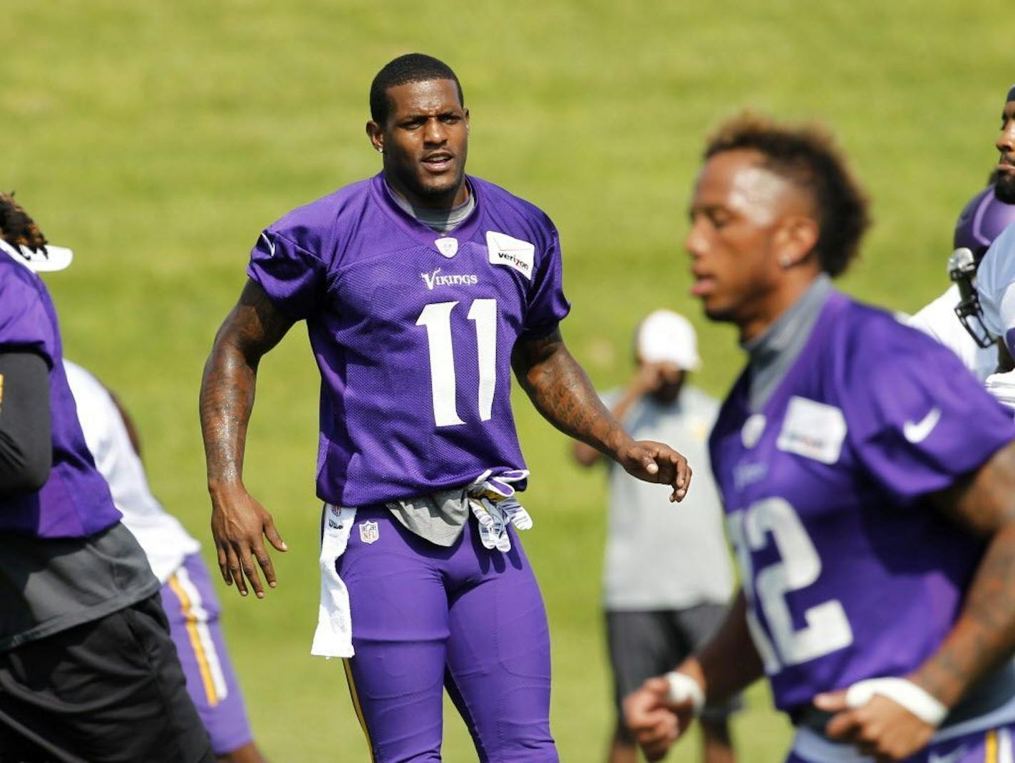 Minnesota Vikings wide receiver Mike Wallace (11) warms up during NFL football minicamp in Eden Prairie, Minn., Wednesday, June 17, 2015.