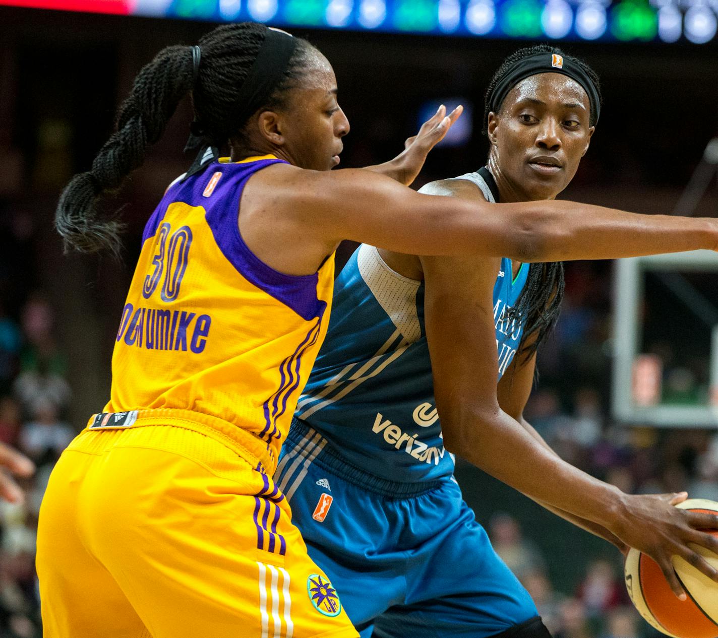 Minnesota Lynx center Sylvia Fowles looks to past Los Angeles Sparks' Nneka Ogwumike during the second half on Friday, Aug. 11, 2017, at Xcel Energy Center. ] COURTNEY PEDROZA &#x2022; courtney.pedroza@startribune.com; Friday, Aug. 11, 2017; Minnesota Lynx vs. Los Angeles Sparks; Xcel Energy Center; St. Paul, MN