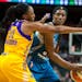 Minnesota Lynx center Sylvia Fowles looks to past Los Angeles Sparks' Nneka Ogwumike during the second half on Friday, Aug. 11, 2017, at Xcel Energy C