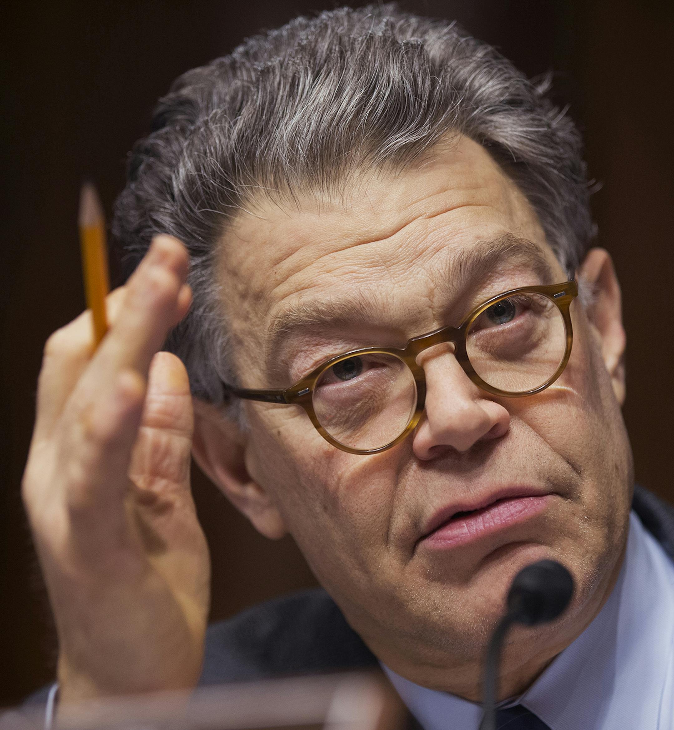 Senate Judiciary Committee member Sen. Al Franken, D-Minn., questions panel of witnesses during the committee's hearing on "Continued Oversight of U.S. Government Surveillance Authorities" Wednesday, Dec. 11, 2013, on Capitol Hill in Washington. (AP Photo/Manuel Balce Ceneta) ORG XMIT: MIN2013122217513268