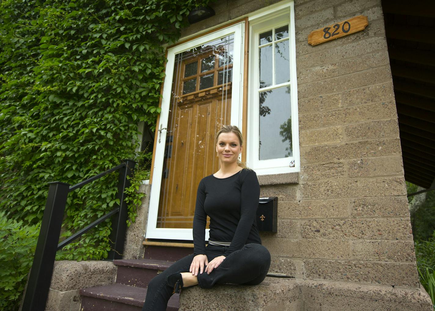 Elisabeth Crosby outside the home in the Morgan Park neighborhood of Duluth that she has rented out through Airbnb. ] Brian.Peterson@startribune.com Duluth, MN - 7/03/2015