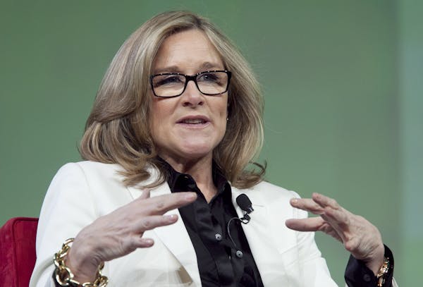 FILE - In this Wednesday, Jan. 18, 2012, file photo, Burberry CEO Angela Ahrendts speaks at the National Retail Federation's annual convention in New 