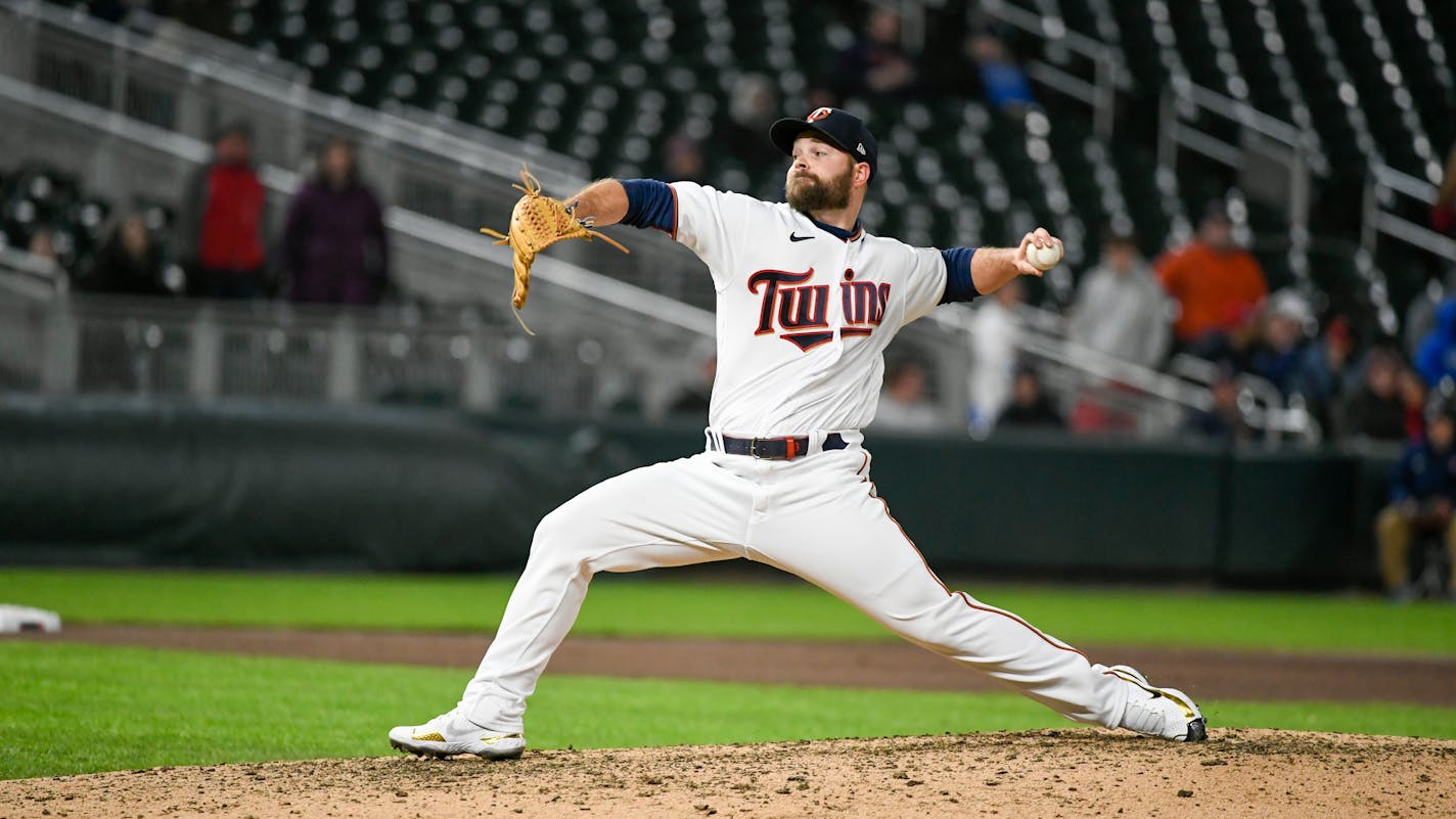 Minnesota Twins pitcher Danny Coulombe throws against the Detroit Tigers during the ninth inning of a baseball game, Wednesday, April 27, 2022, in Minneapolis. Twins won 5-0. (AP Photo/Craig Lassig)