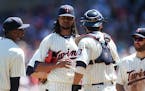 Minnesota Twins starting pitcher Ervin Santana (54) is spoken to on the mound against the Pittsburgh Pirates at Target Field in Minneapolis on Wednesd