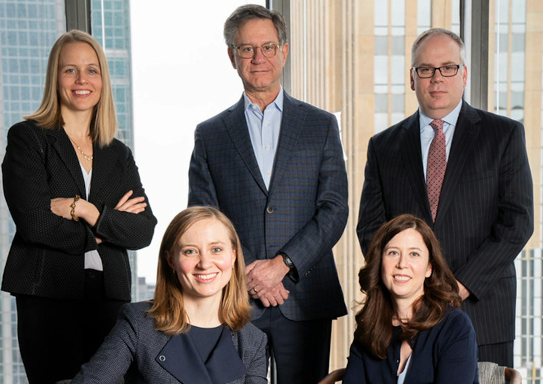 Back row from the left: Leita Walker, partner in litigation; Richard Thomson, senior counsel in litigation; and Benjamin W. Johnson, partner in public finance. Front row: Karla Vehrs, managing partner of the office, and Amy L. Schwartz, of counsel in litigation