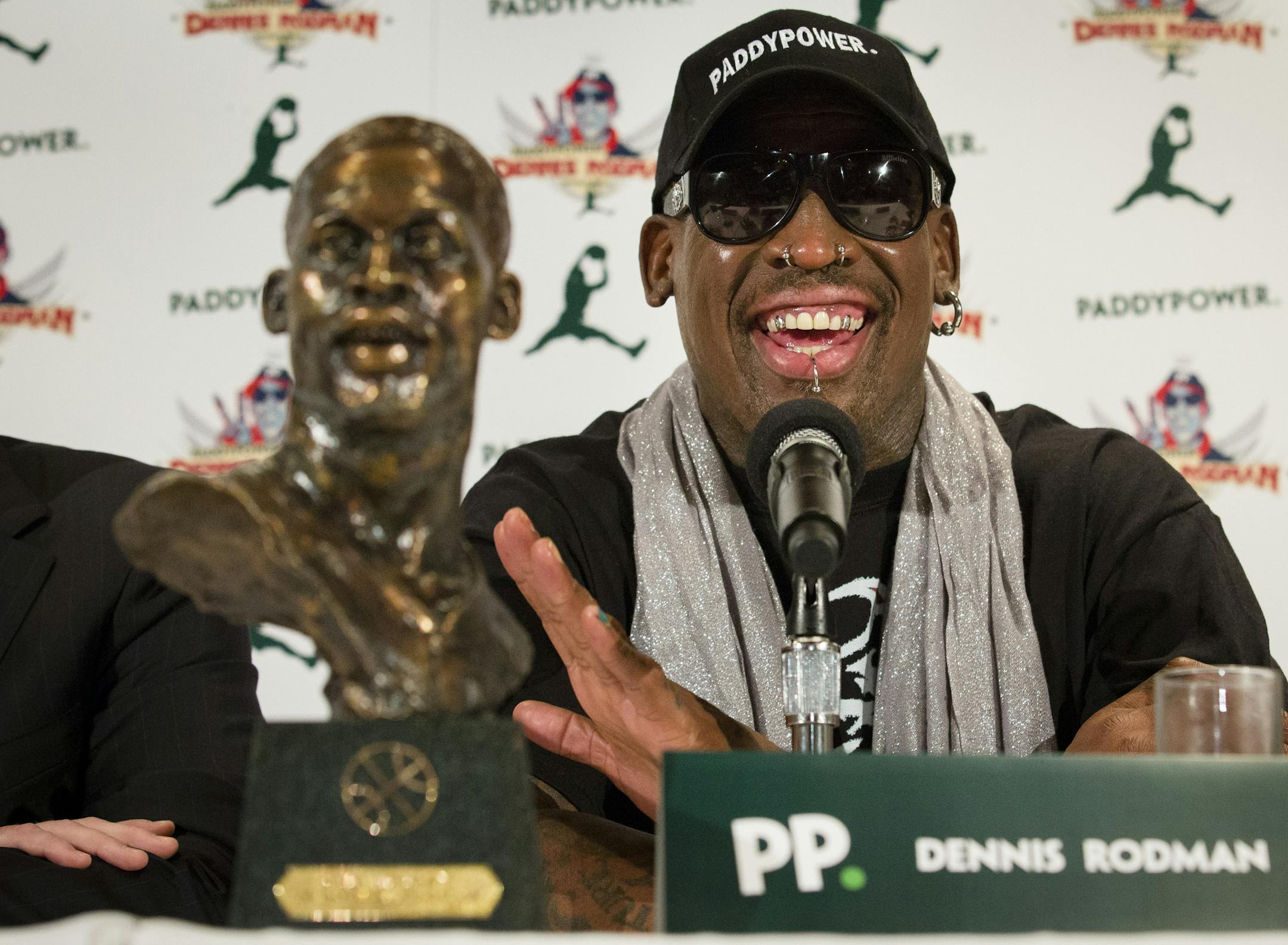 Former NBA basketball player Dennis Rodman speaks to the media during a news conference in New York, Monday, Sept. 9, 2013. Rodman is going back to North Korea, and he says he will bring a team of former NBA players with him. Days after returning from his second trip to visit North Korean leader Kim Jong Un, Rodman announced plans to stage two exhibition games there in January. (AP Photo/John Minchillo)