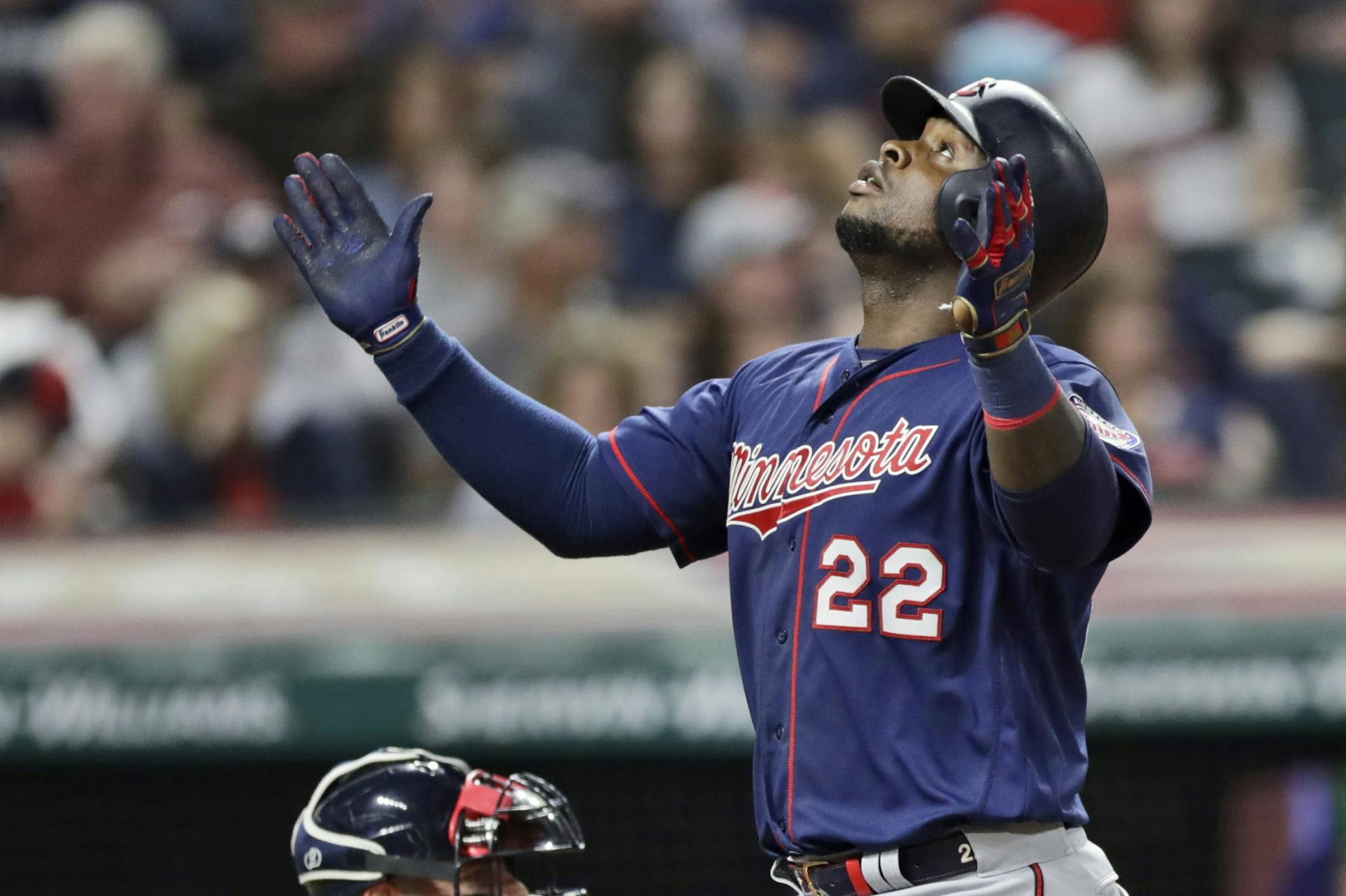 Minnesota Twins' Miguel Sano looks up after hitting a Grand Slam in the eighth inning in the second baseball game of a baseball doubleheader against the Cleveland Indians, Saturday, Sept. 14, 2019, in Cleveland.