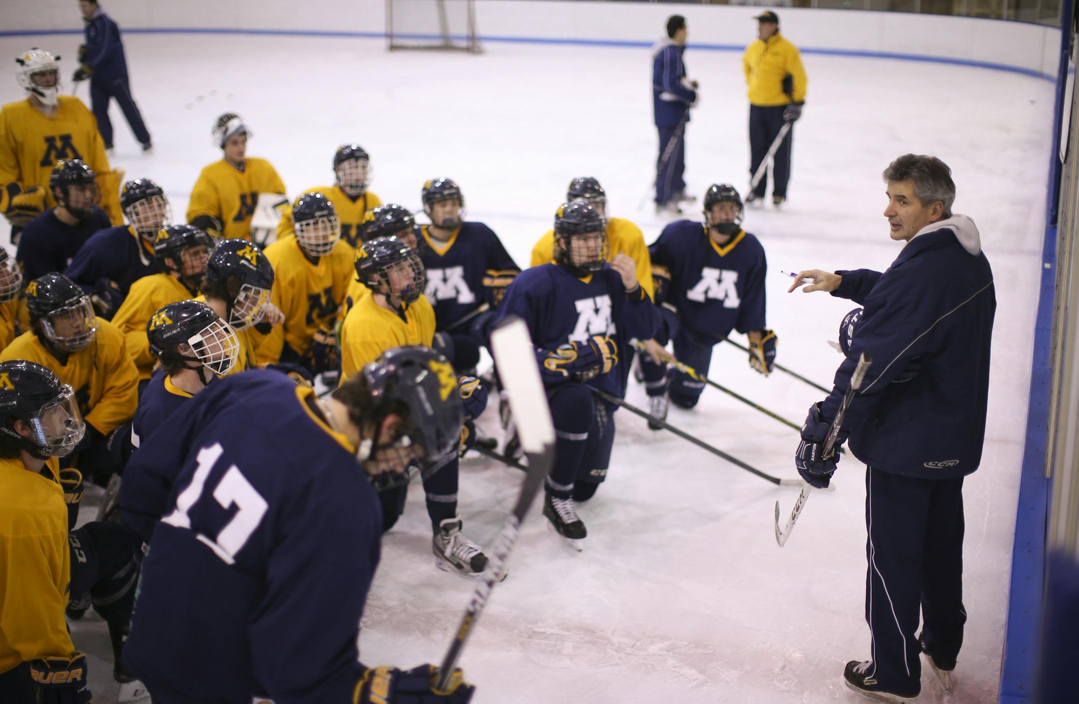 Mahtomedi boy's head coach Jeff Poeschl outlined a drill for his team during practice Monday afternoon. ] JEFF WHEELER ‚Ä¢ jeff.wheeler@startribune.com The Mahtomedi boy's hockey team practiced at the White Bear Lake Sports Center Monday afternoon, December 1, 2014.