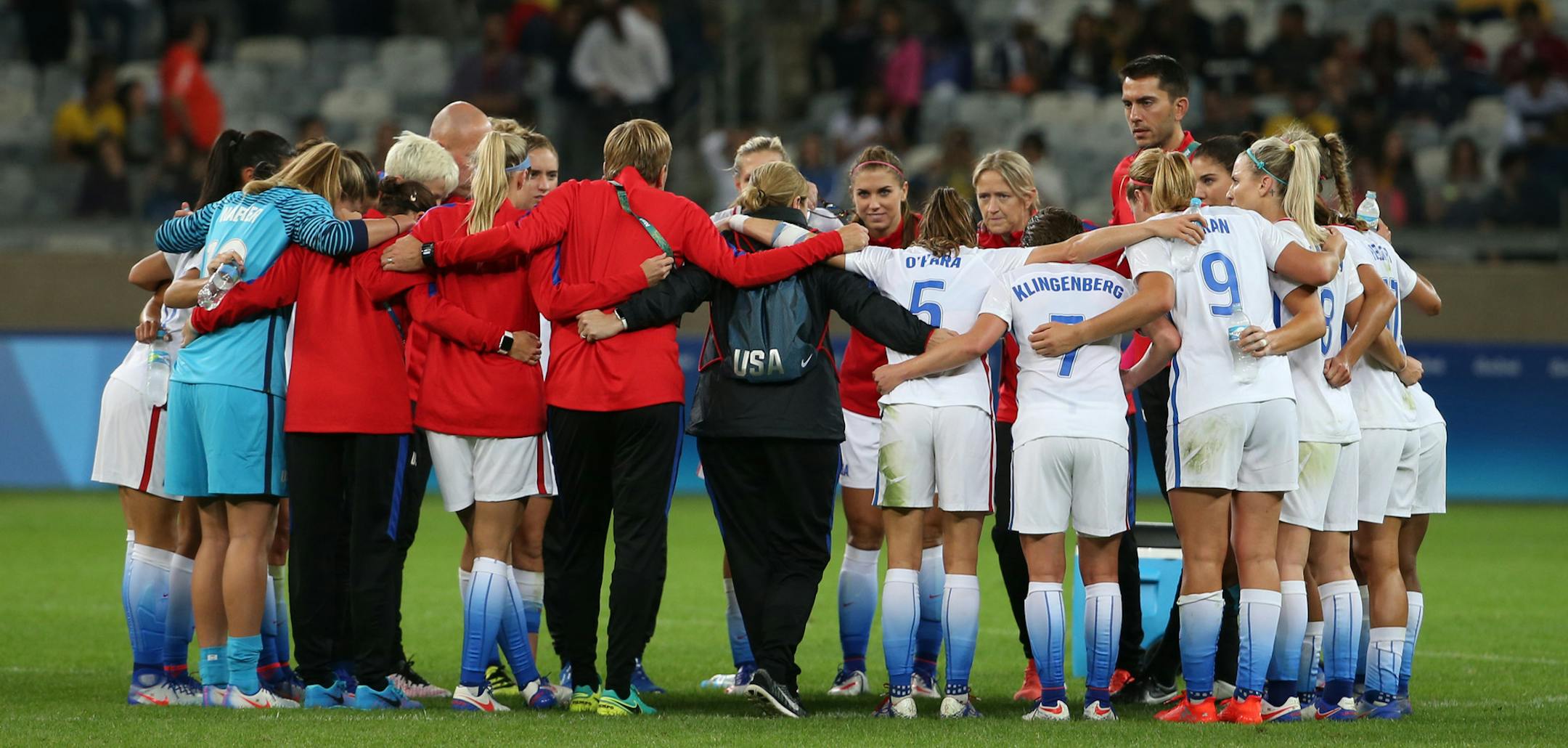 United States team gather on the middle of the pitch after defeating New Zealand during a women's Olympic football tournament match at the Mineirao stadium in Belo Horizonte, Brazil, Wednesday, Aug. 3, 2016. United States won 2-0. (AP Photo/Eugenio Savio)