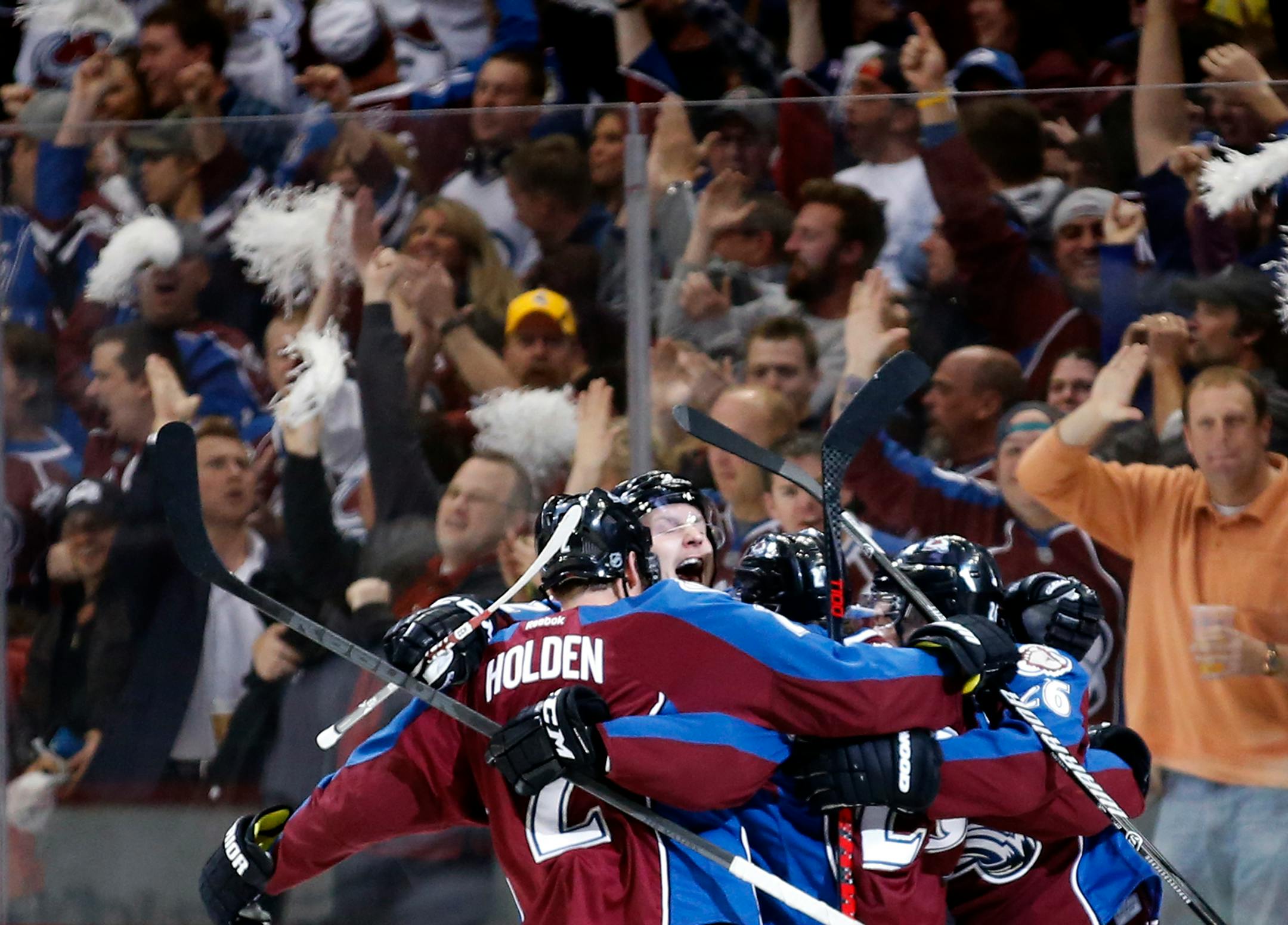 Colorado players celebrated after a goal by Nathan MacKinnon in the first period.