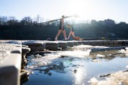 The University of Minnesota women’s rowing team practiced in 50-degree temps on the Mississippi River in Minneapolis on Jan. 31.