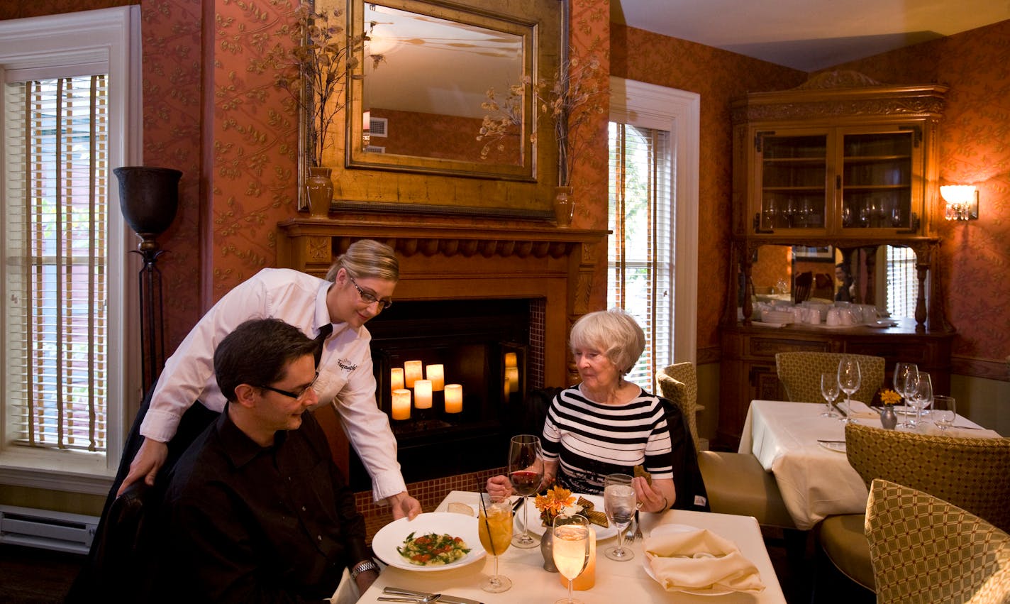 Moiva Affinito and her son, Doug Affinito, enjoy dinner together at Forepaugh's, served by Jennifer Syrutz.