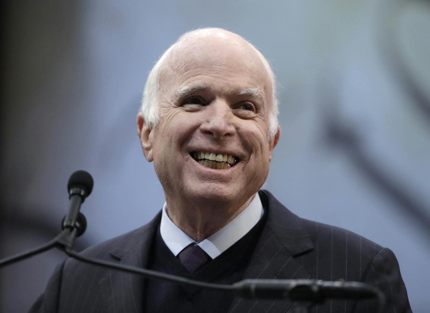 FILE - In this Oct. 16, 2017 file photo, Sen. John McCain, R-Ariz., receives the Liberty Medal from the National Constitution Center in Philadelphia. McCain's family says the Arizona senator has chosen to discontinue medical treatment for brain cancer. (AP Photo/Matt Rourke)