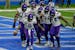 Minnesota Vikings quarterback Kirk Cousins (8) and teammates react after Cousins' touchdown during the second half of an NFL football game against the