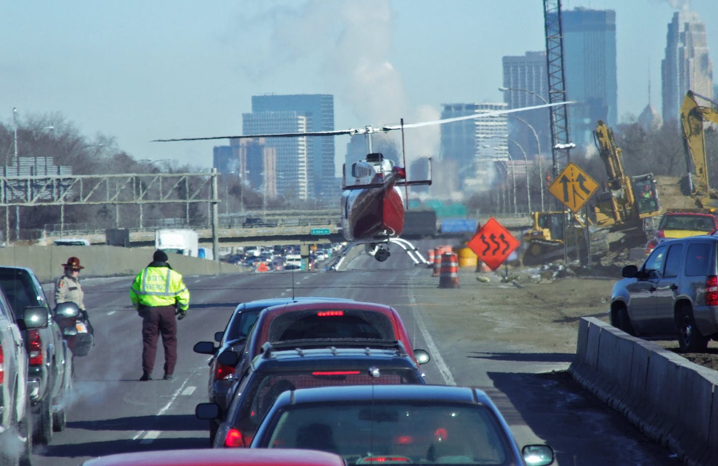 A State Patrol helicopter took off after landing on northbound Interstate 35W to drop off a member of a reconstruction team investigating a fatal accident Friday morning. The helicopter helped provide a fuller view of the accident scene and allowed overhead photos to be taken, State Patrol officials said. The accident, during the rush hour and near 46th Street in Minneapolis, tied up traffic for hours.