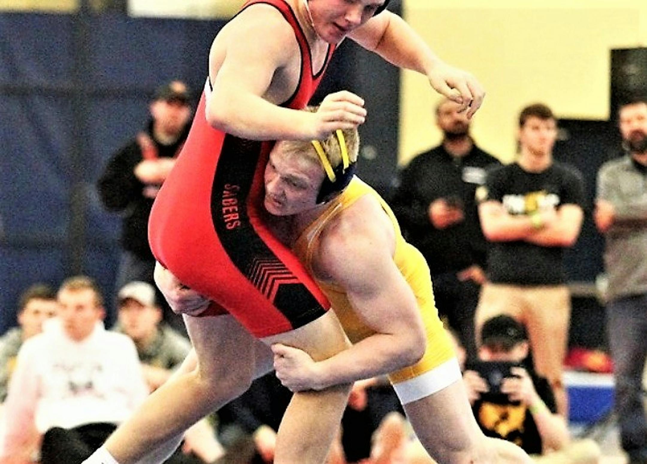 Prior Lake's Calvin Sund works to take down an opponent