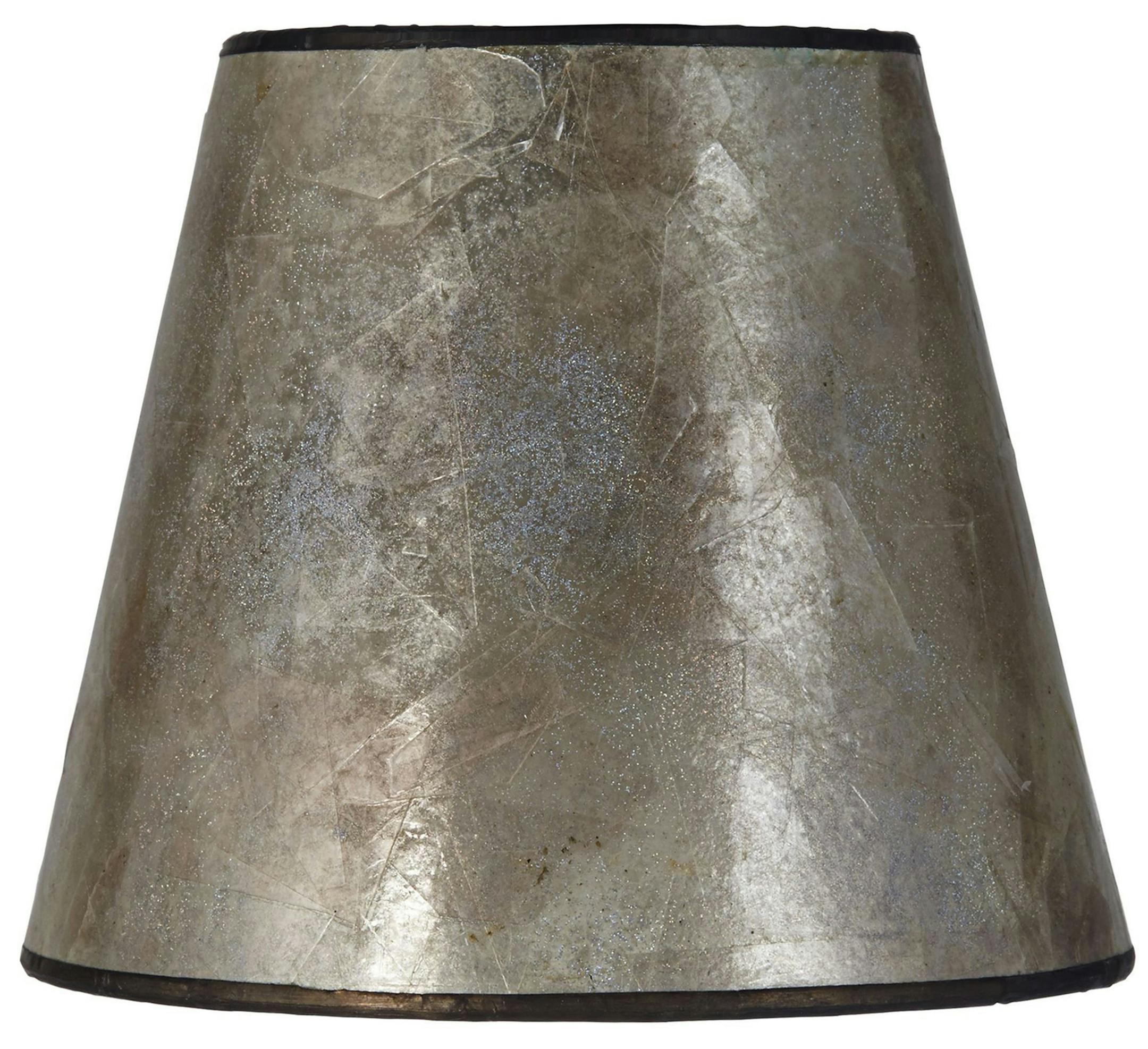 This natural mica shade adds a warm glow when light shines through it. It's $14.99 from Lamps Plus, www.lampsplus.com (Lamps Plus)