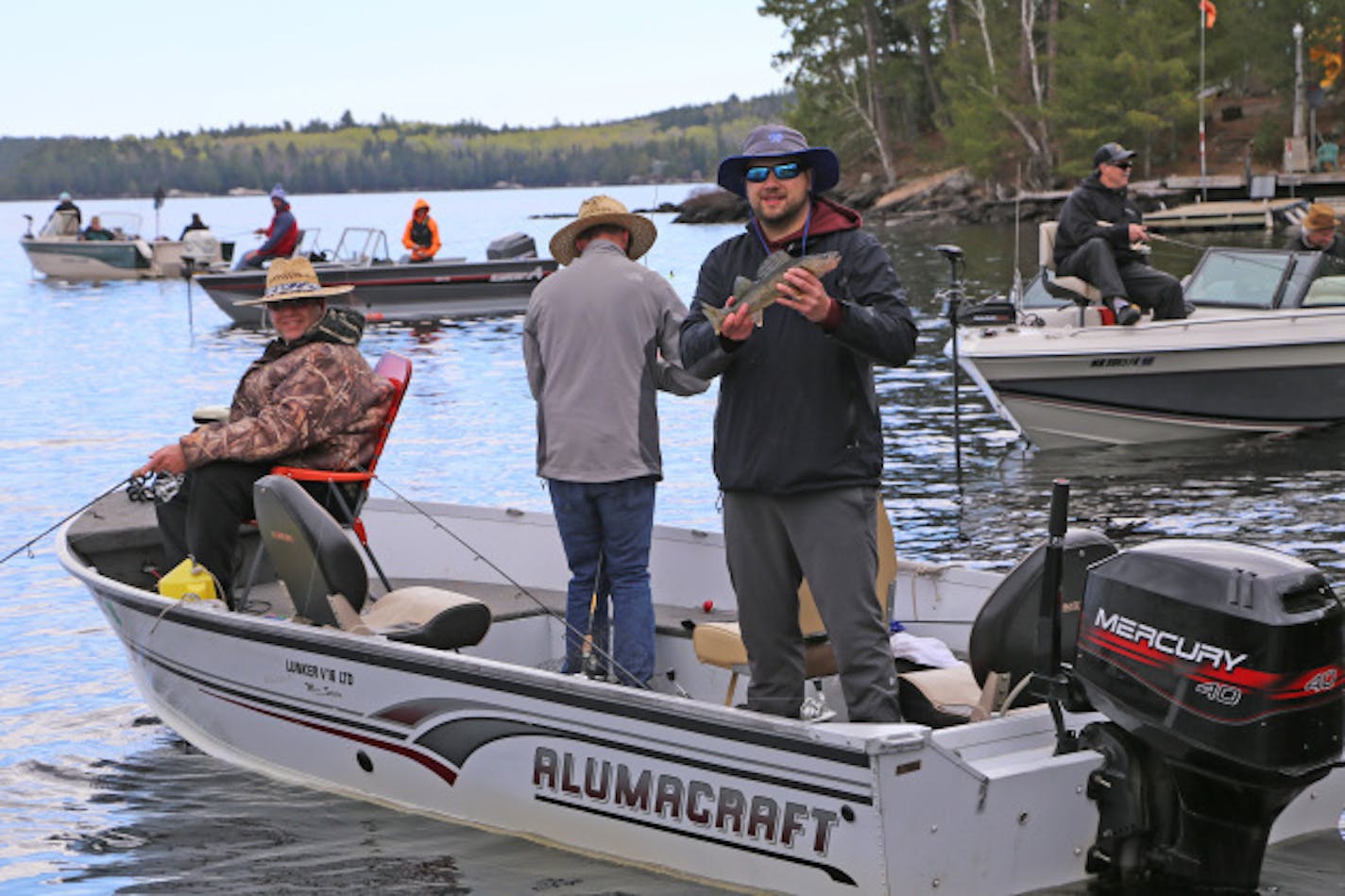 Chris Stavnes of Minneapolis was all smiles after catching a plump walleye Saturday morning while fishing on Crane Lake near the Minnesota-Ontario border.