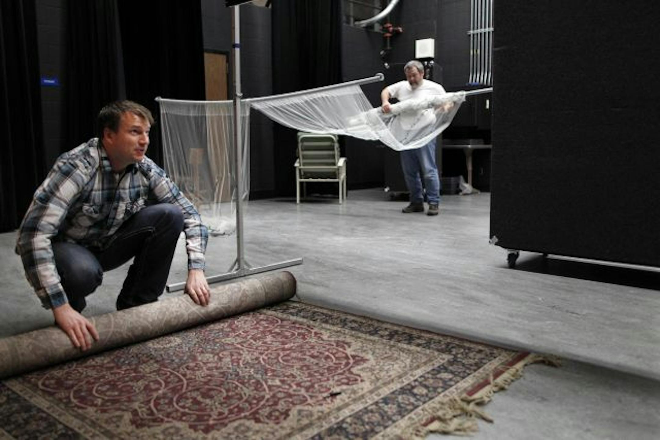 At the Valley Creek Church service held at Oak Land Jr. H.S., senior pastor Trent Redmann helps pack up the church items which go neatly into 24 boxes that fit into 2 24-foot trailers.
