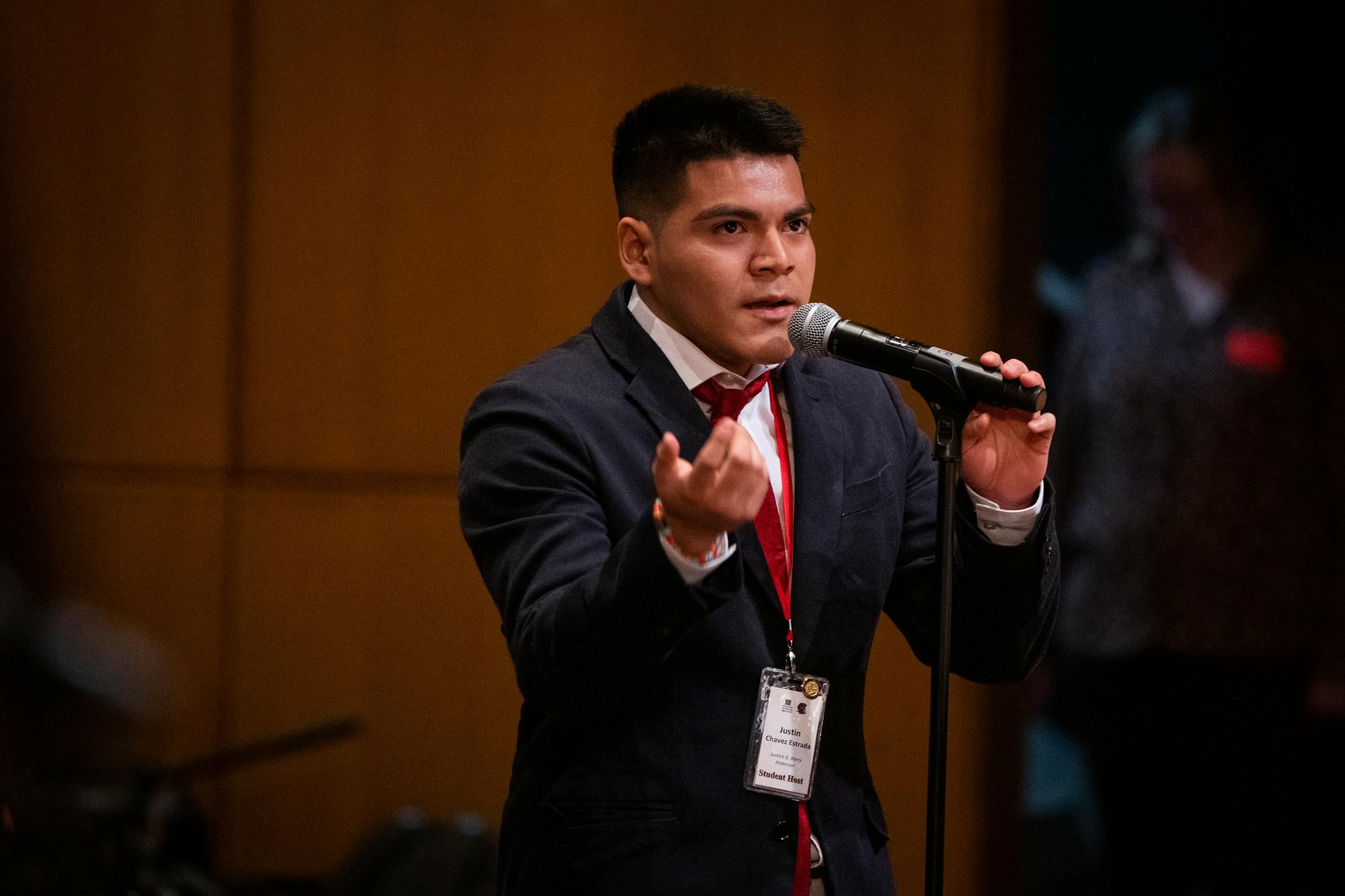 Justin Chavez Estrada, a senior at Richfield High School, asks questions of the Minnesota Supreme Court during a Q&amp;A after the Court convened to hear oral arguments in the case Cruz-Guzman v. State of Minnesota inside the auditorium at Richfield High School.