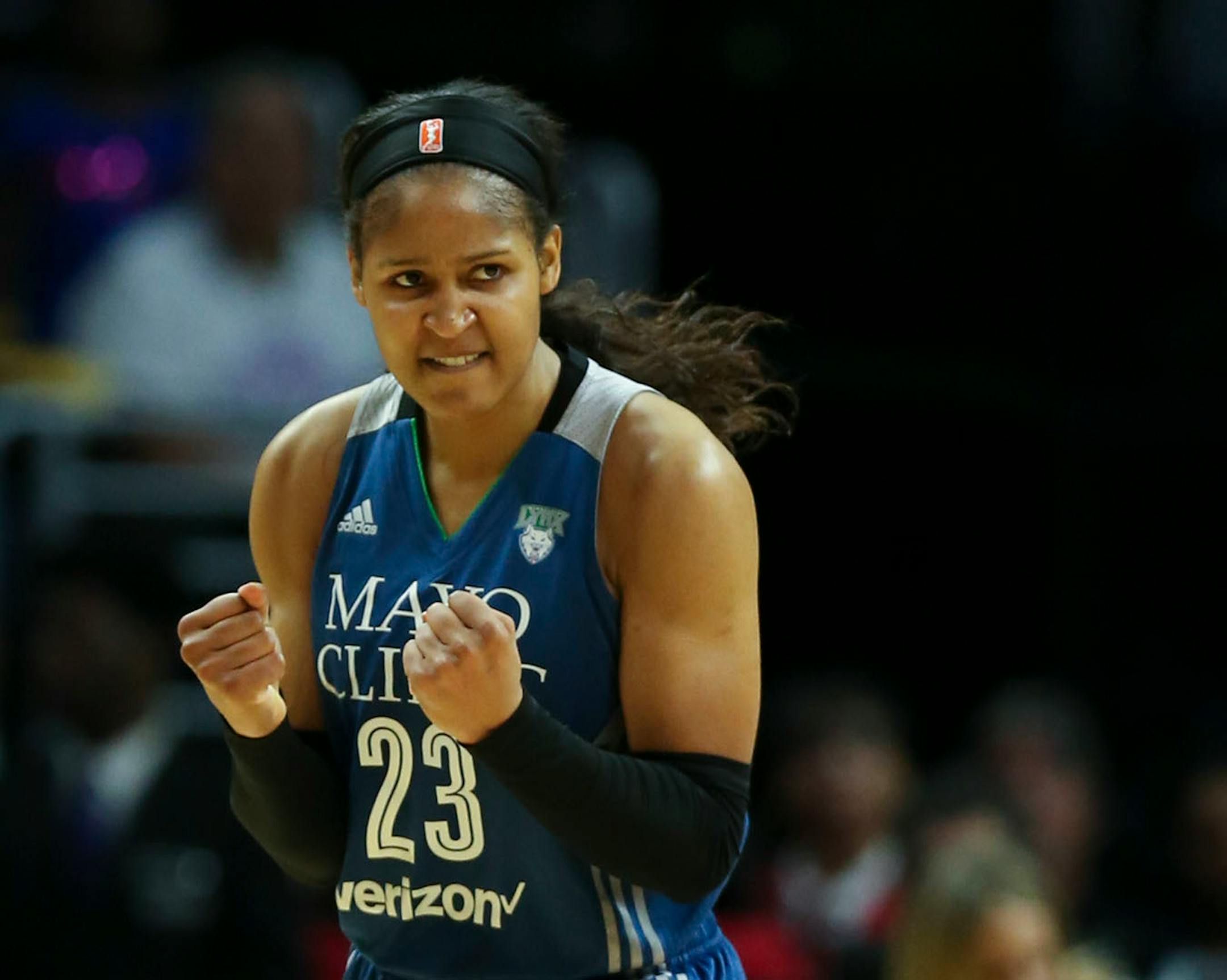 Minnesota Lynx forward Maya Moore (23) reacted to being fouled by Los Angeles Sparks forward Essence Carson (17) in the fourth quarter.