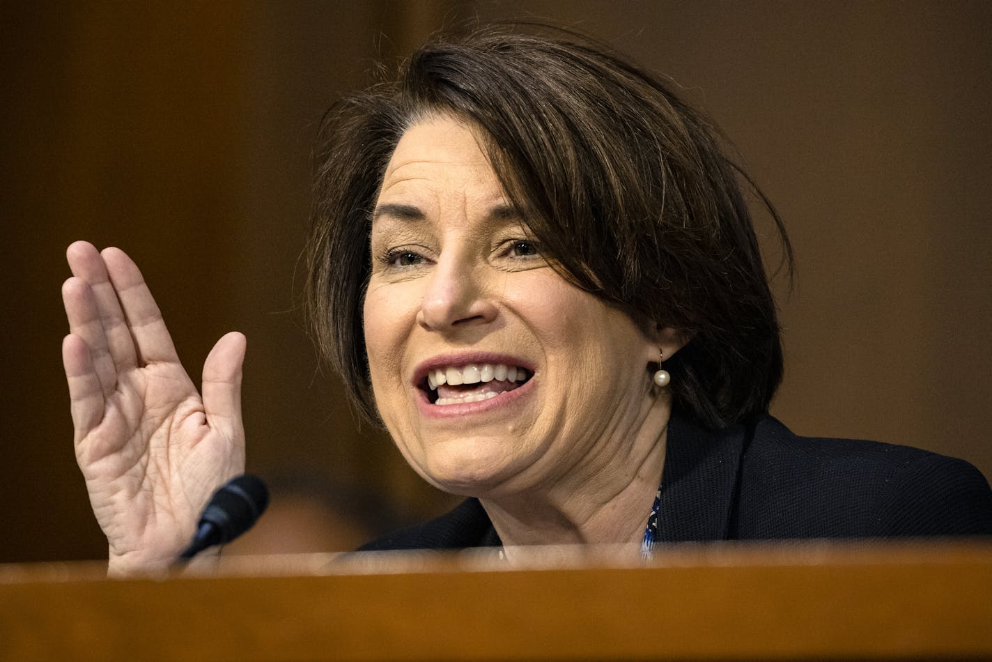 Sen. Amy Klobuchar, D-Minn., speaks during the confirmation hearing for Supreme Court nominee Amy Coney Barrett, before the Senate Judiciary Committee, Thursday, Oct. 15, 2020, on Capitol Hill in Washington. (Samuel Corum/Pool via AP)