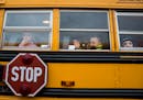 Students sit on the bus at the end of the school day at Eastview Elementary School in Lakeville on Wednesday, November 11, 2015. ] (LEILA NAVIDI/STAR 