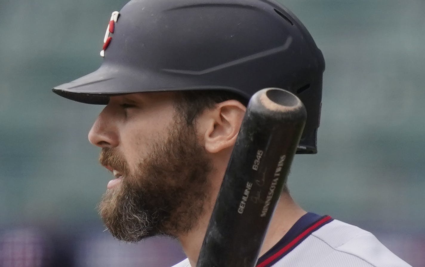 Minnesota Twins' Jake Cave prepares to bat during the first inning of a baseball game, Sunday, Aug. 30, 2020, in Detroit. (AP Photo/Carlos Osorio)