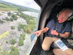 Gov. Tim Walz surveys flooding from a helicopter over Waterville on Tuesday. Walz and Sen. Amy Klobuchar flew over affected communities to assess dama