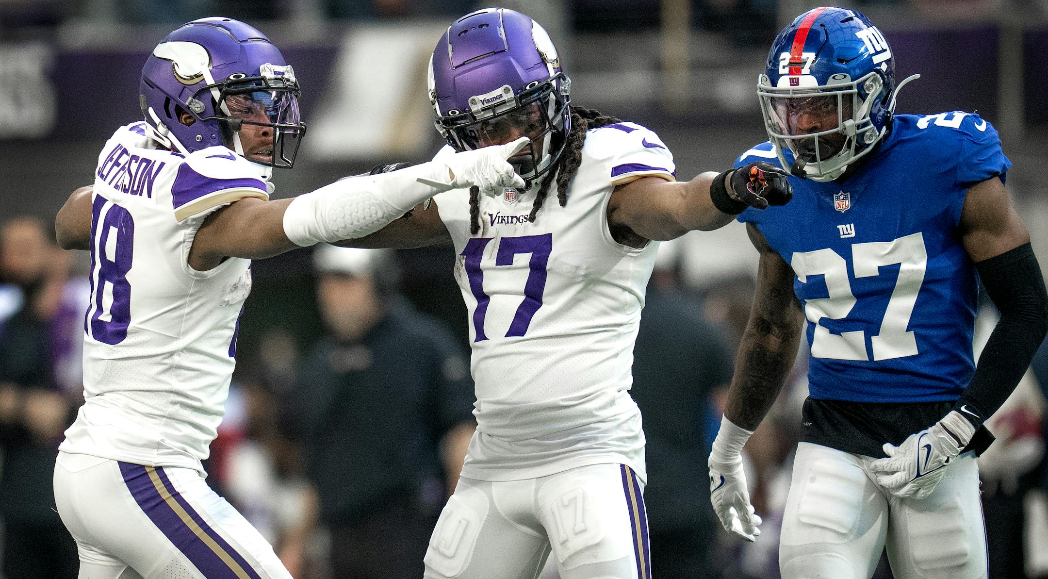 Minnesota Vikings wide receiver Justin Jefferson (18) celebrates a first down catch with K.J. Osborn (17) in the third quarter in Minneapolis, Minn., Saturday December 24, 2022.