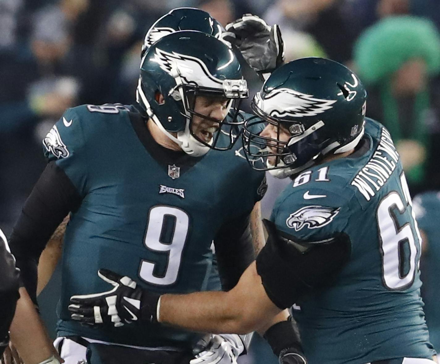 Philadelphia Eagles quarterback Nick Foles (9) celebrates a touchdown with Philadelphia Eagles defensive end Aziz Shittu (61)
2Q ] CARLOS GONZALEZ &#xef; cgonzalez@startribune.com - Philadelphia, PA - Lincoln Financial Field, NFL, NFC Championship game, Minnesota Vikings vs. Philadelphia Eagles