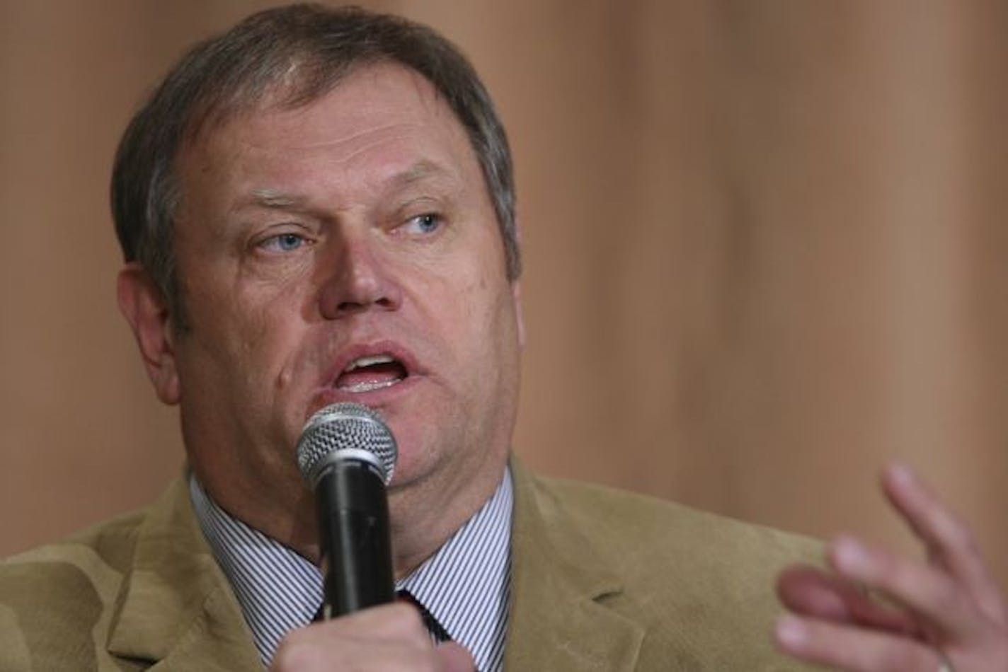 DFL candidate Tom Bakk answered a question during the gubernatorial debate Wednesday night at the Sheraton Bloomington.