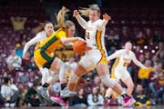 Center Sophie Hart, seen defending against North Dakota State guard Heaven Hamling March 29, has scored in double figures in all four WNIT games and h