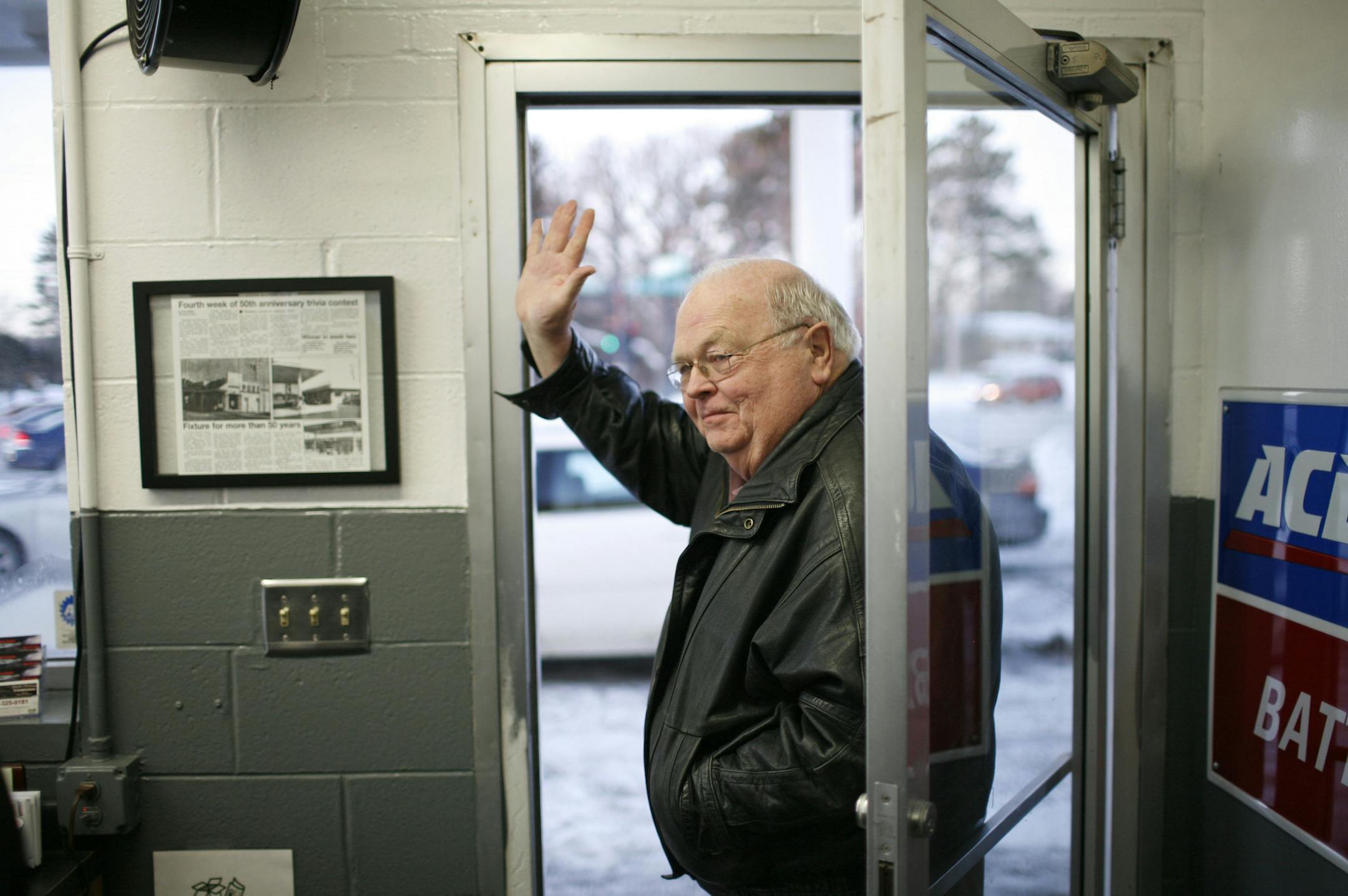 Dave Norland heads out after visiting with the morning crew who gather for coffee and donuts and hot/spicy spam and crackers and lots of talk and humour. It was just after 8a.m. in the morning. ] Scott Schulte's Hi Ten Service Station in Coon Rapids doesn't open until 6 a.m., but he's up at 3 each morning and has coffee brewing at the shop by 4:30 for a group of dedicated customers, characters and employees who often arrive before dawn. It's something his father, Mel, did when he owned the stati