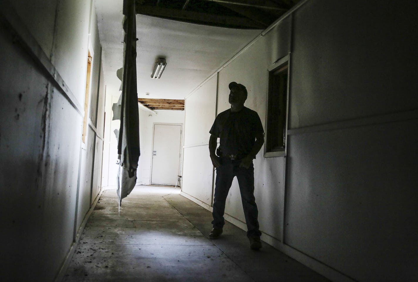 A portion of sheetrock from a collapsed ceiling at Crazy Horse School dangles from joists and without money to repair it, the school was forced to close the hallway down and was seen Wednesday, Sept. 17, 2014, on the Pine Ridge Indian Reservation in South Dakota.](DAVID JOLES/STARTRIBUNE)djoles@startribune.com At Bug-O-Nay-Ge-Shig in northern Minnesota &#x201a;&#xc4;&#xee; and on reservations across the country &#x201a;&#xc4;&#xee; the educational promises this nation made to tribes are being br