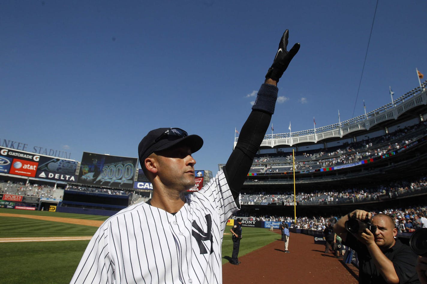 New York Yankees' Derek Jeter gestures to the crowd while leaving the field after a baseball game against the Tampa Bay Rays, Saturday, July 9, 2011, at Yankee Stadium in New York. The Yankees won the game 5-4. Jeter homered for his 3,000th hit while going 5 for 5 with the tiebreaking single in the eighth inning. (AP Photo/Frank Franklin II) ORG XMIT: NYY118