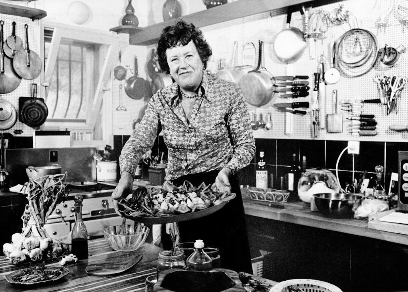 Julia Child with a salade Nicoise she prepared in her vacation home in Grasse, southern France, in April 1978.