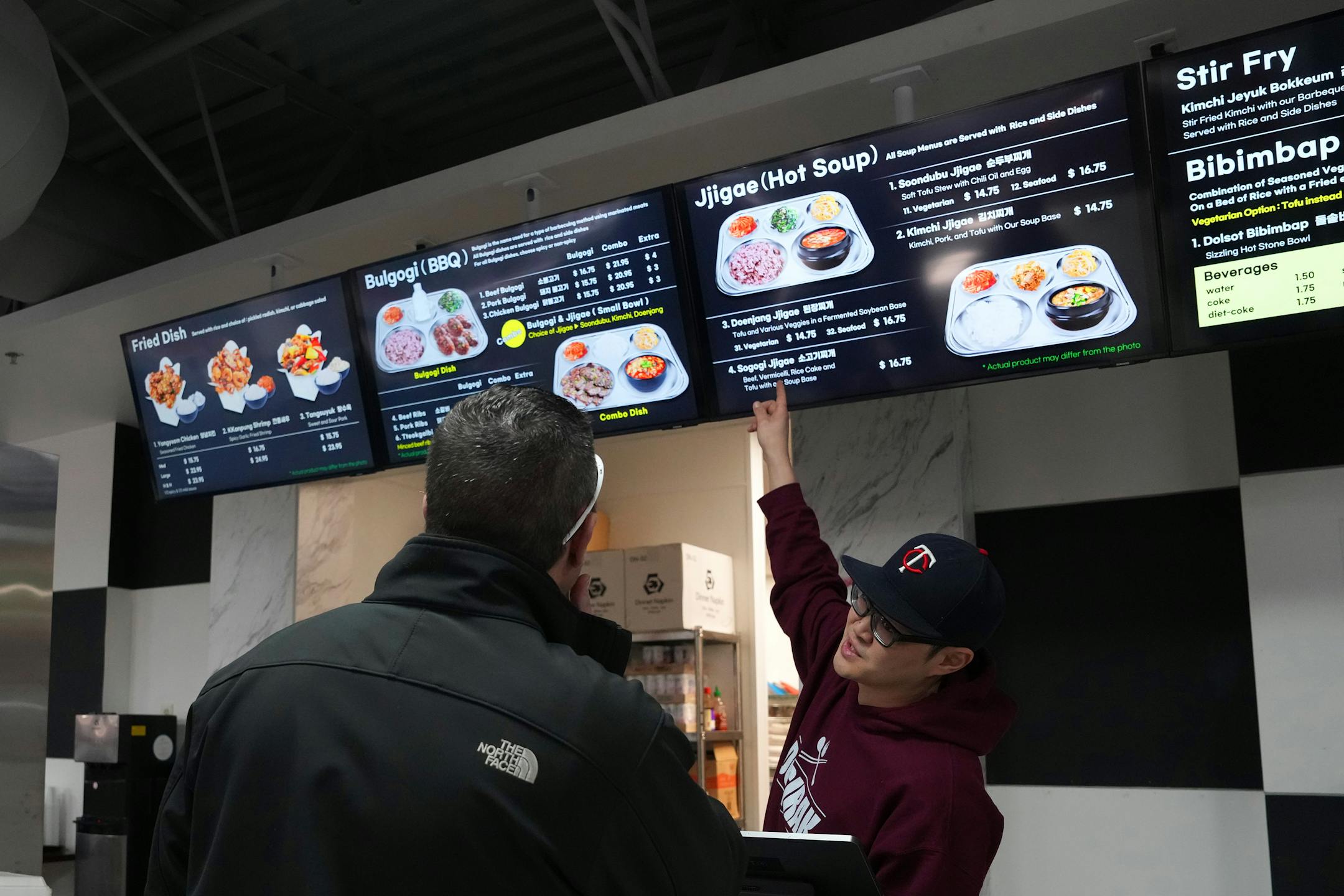 Dosirak manager Andrew Yun takes an order at the counter.