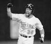 October 26, 1991 Home Sweet Dome -- Minnesota Twins Kirby Puckett reacts after hitting a solo homerun in the 11th inning of Game 6 to win the game and