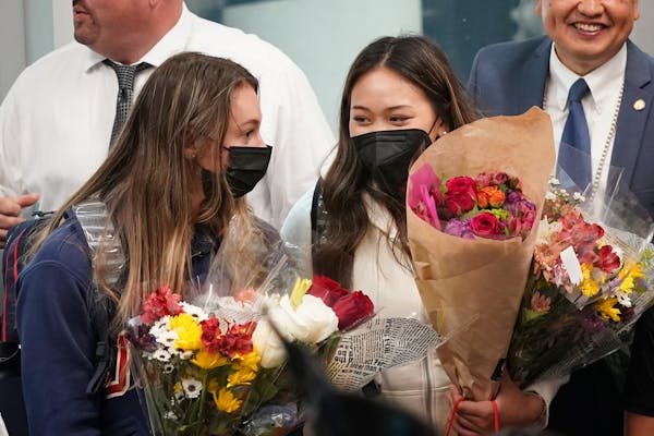 Minnesota gymnasts Grace McCallum and Suni Lee arrived at Minneapolis St. Paul International Airport to hundreds of cheering fans.