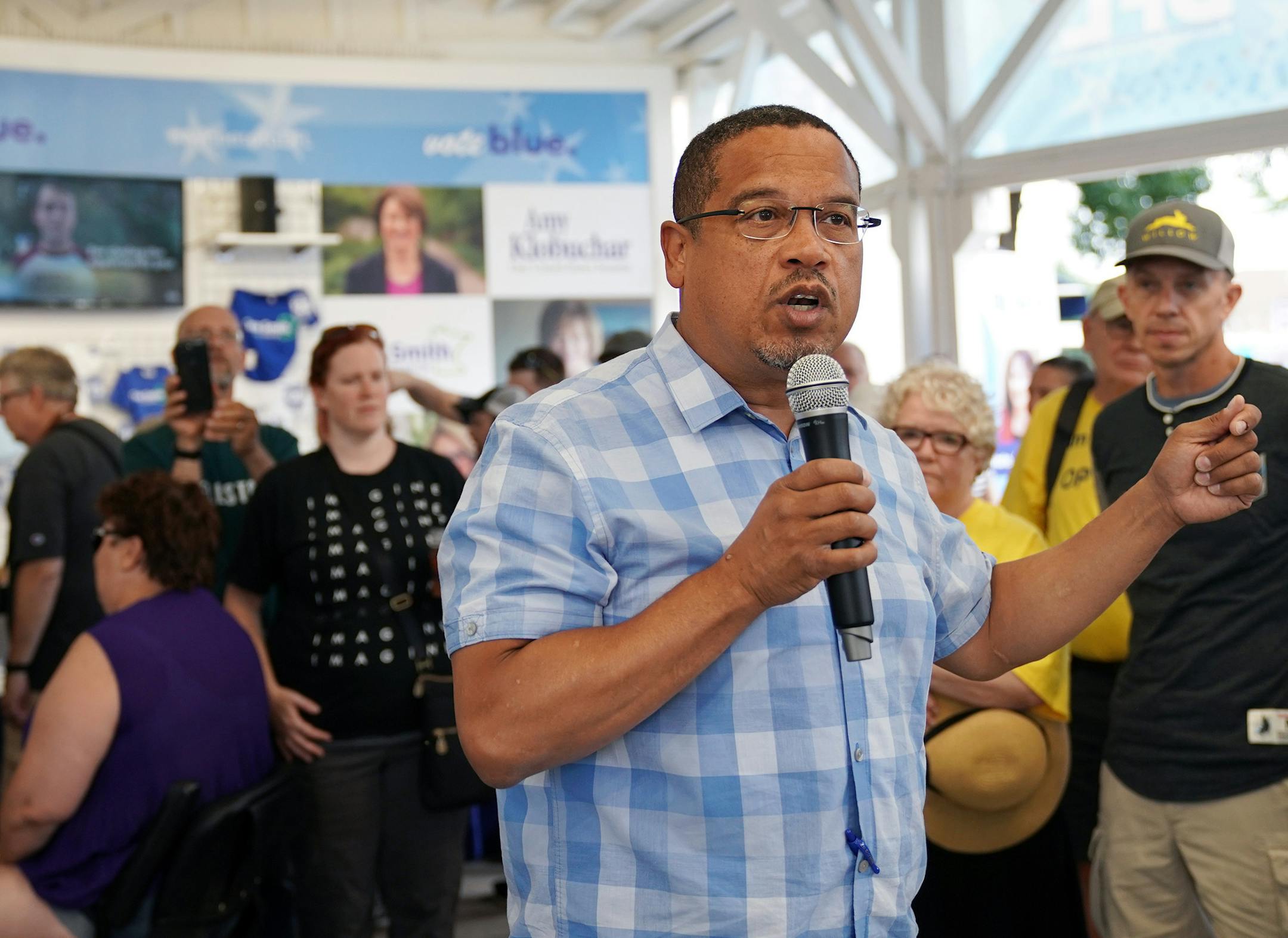 U.S. Rep. Keith Ellison, who's running for state attorney general, spoke with fairgoers Saturday. ] ANTHONY SOUFFLE &#xef; anthony.souffle@startribune.com U.S. Rep. Keith Ellison, who's running for state attorney general, spoke with fairgoers Saturday, Aug. 25, 2018 in the DFL booth at the Minnesota State Fair in St. Paul, Minn.