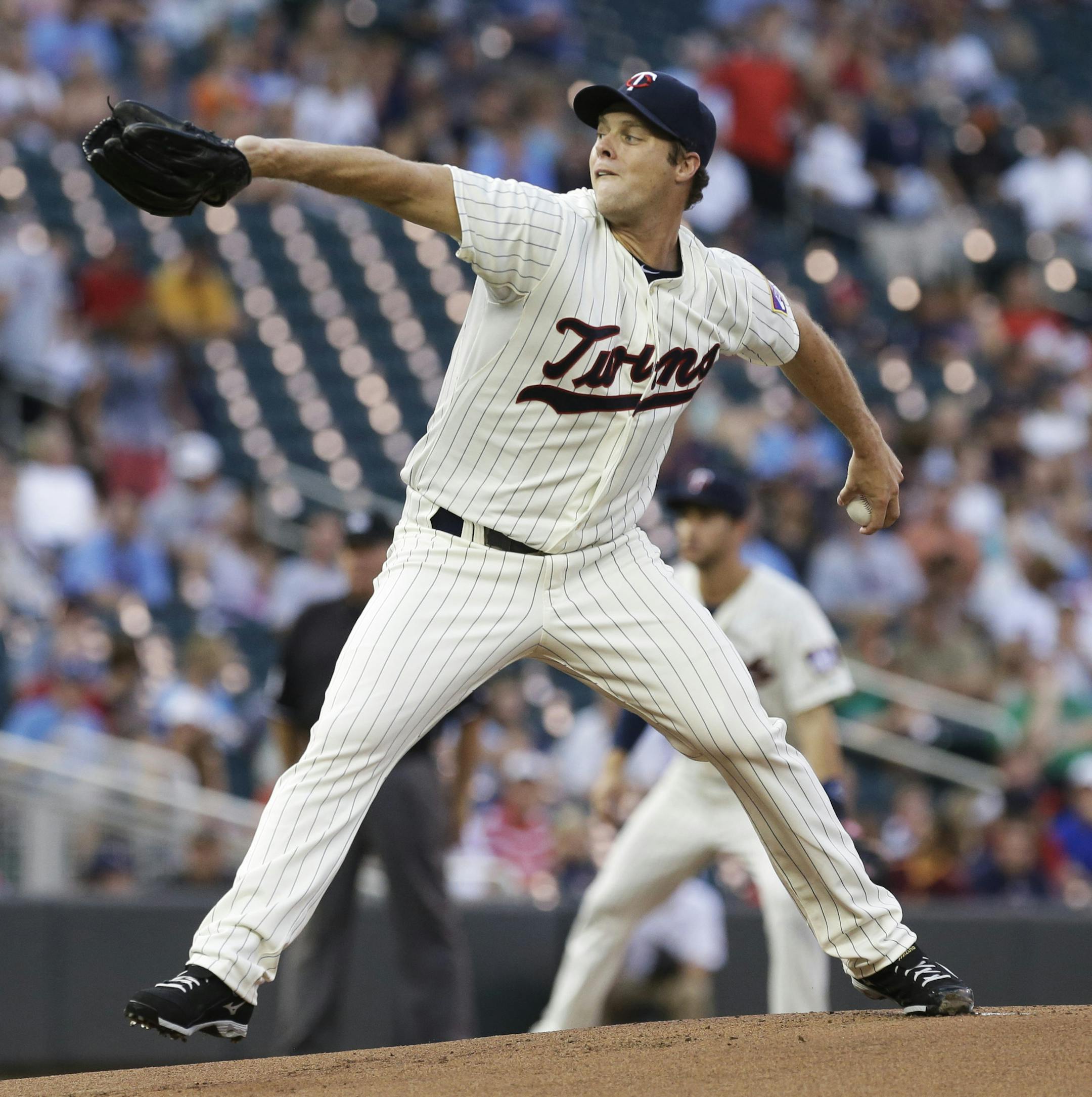 Minnesota Twins pitcher Andrew Albers throws against the Kansas City Royals in the first inning of a baseball game, Wednesday, Aug. 28, 2013 in Minneapolis. (AP Photo/Jim Mone)