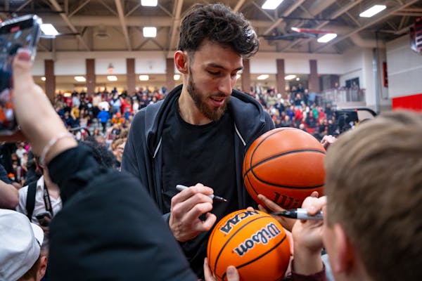 Chet Holmgren, now with the NBA's Oklahoma City Thunder, interacted with fans after having his jersey retired at Minnehaha Academy last Friday.