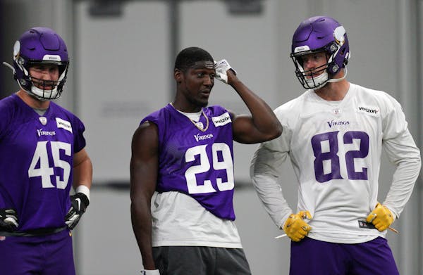 Vikings tight end Kyle Rudolph (82) stood with cornerback Xavier Rhodes (29) during Tuesday's mandatory minicamp. ] ANTHONY SOUFFLE &#x2022; anthony.s