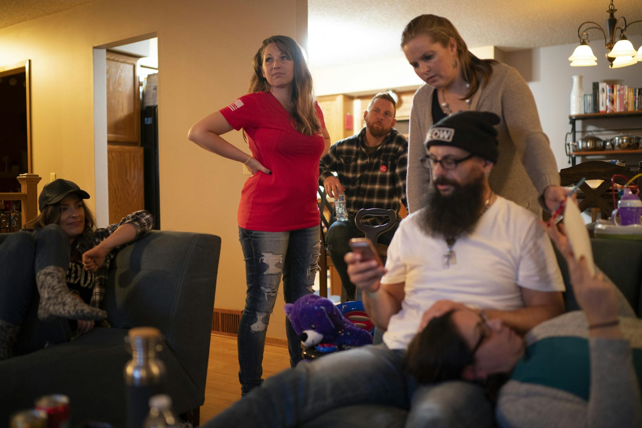 Amanda Garcia, center, watched returns with her friends and family Tuesday night. The others are, from left, Beth Dordal, Garcia, Jon Dordal, Mary L., Steven Nagy, and Sara Linert.