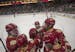 Denver Pioneers forward Jake Durflinger (16) is congratulated by teammates after scoring late in the first period of the NCHC Frozen Faceoff champions