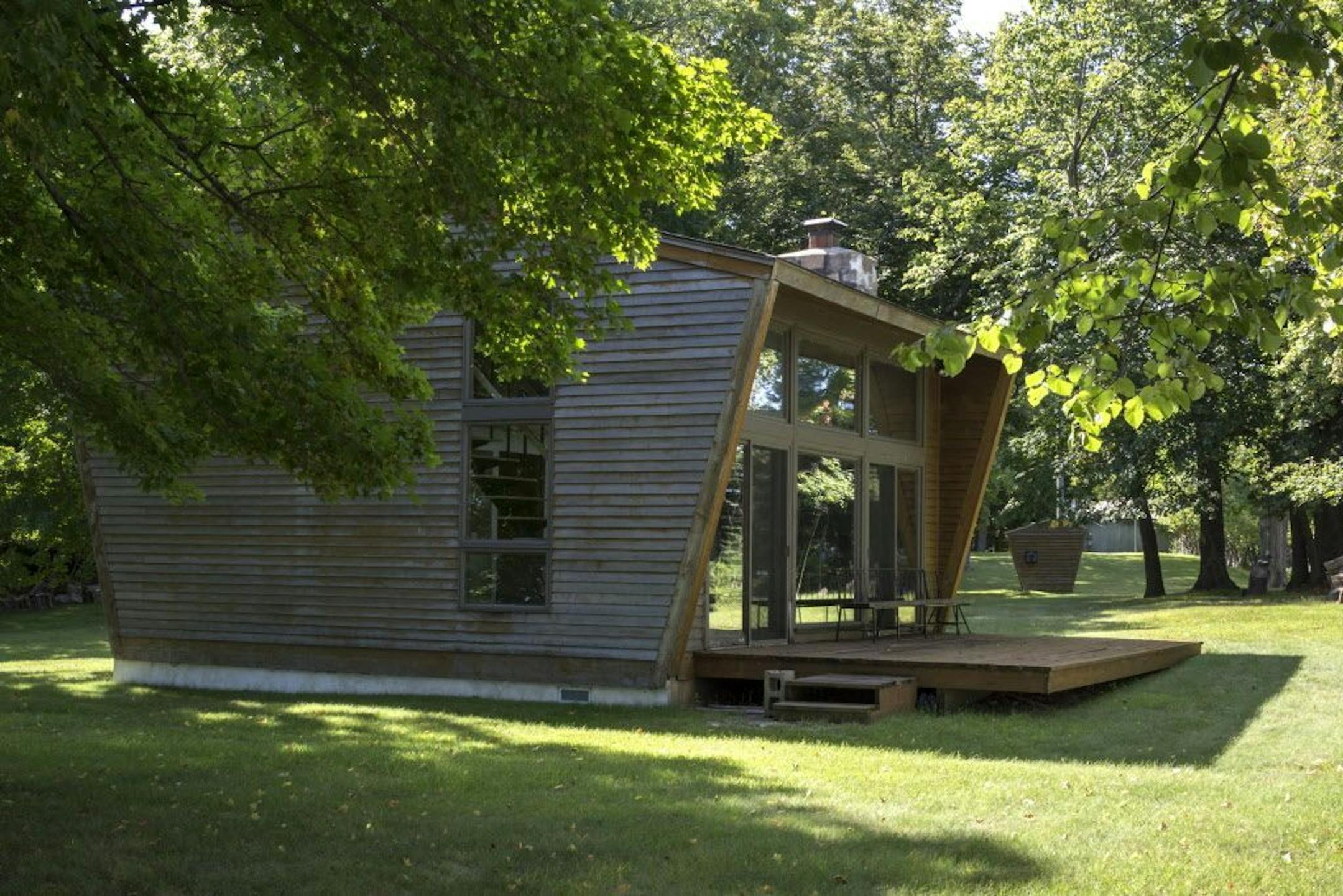 The guest cottage has a kitchen, loft, bedroom, bathroom and wood burning fireplace.