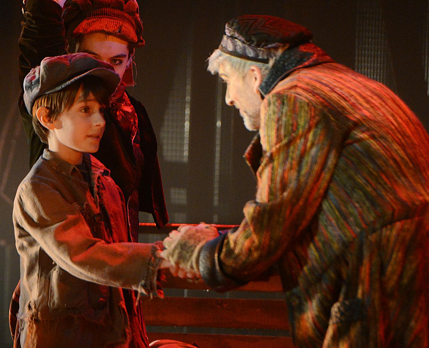 Fagin, played by Bradley Greenwald, speaks to Oliver, played by Nate Turcotte, during a rehearsal of "Oliver!". ] PHOTO SPECIAL TO THE STAR TRIBUNE BRIDGET BENNETT &#x2022; bridget.bennett@startribune.com During a rehearsal for "Oliver!" at Pantages Theatre downtown Minneapolis on Saturday, 31 Jan., 2015. "Oliver!" is the third collaboration between Theater Latte Da and the Hennepin Theatre Trust.