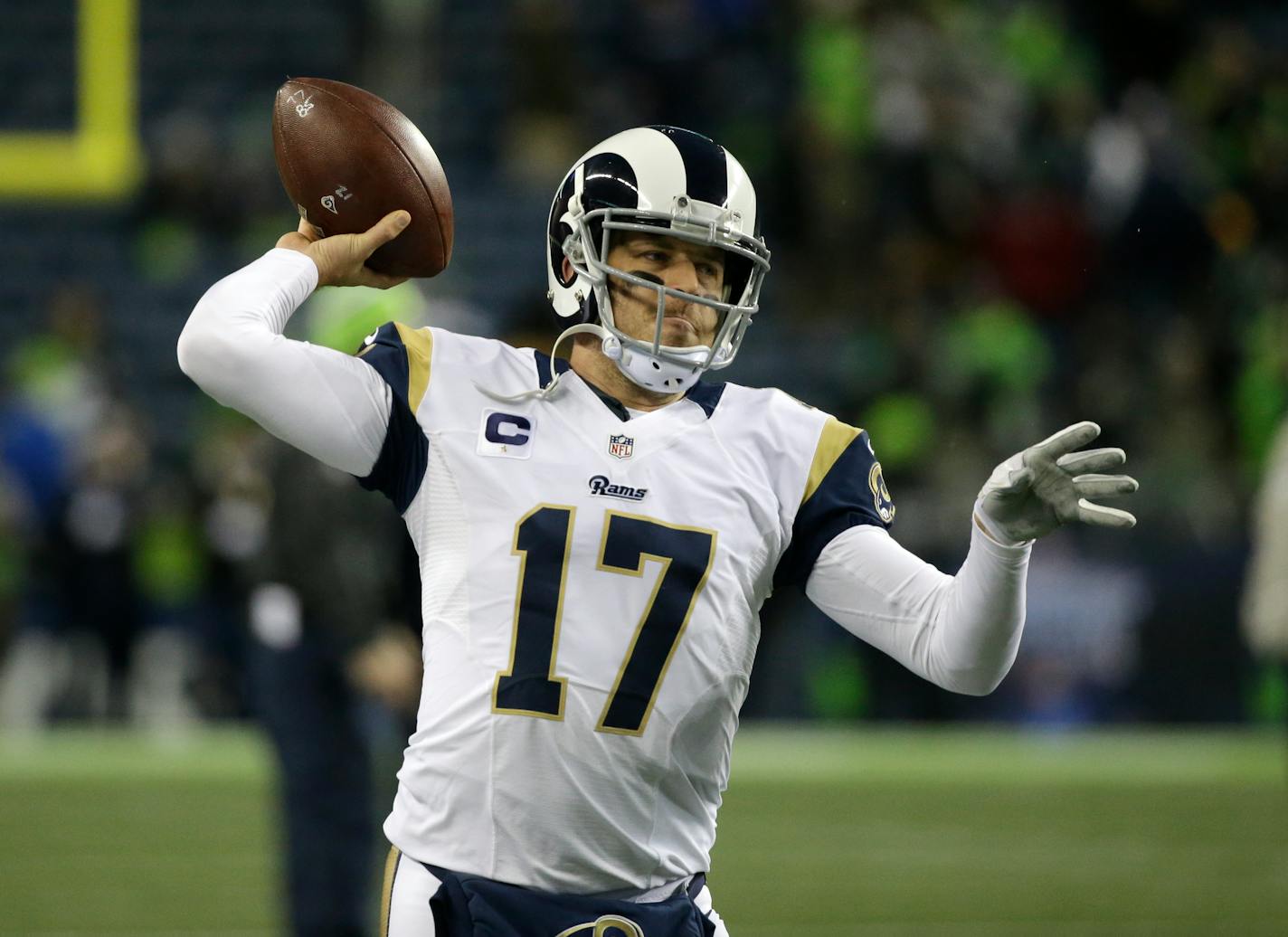 quarterback Case Keenum passes during warmups before an NFL football game against the Seattle Seahawks, Thursday, Dec. 15, 2016, in Seattle. (AP Photo/Elaine Thompson)